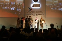 Sahnedeki Göçmenler